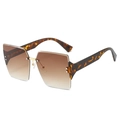 Frameless square sunglasses with brown gradient lenses and tortoiseshell temples - Leopard Legs Tea Lens