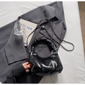 Elegant black ruched cloud bag in glossy patent leather with silver chain strap and handle - Black