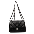 Elegant black quilted leather crossbody bag with silver chain strap and metal turn lock - Black