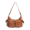 Caramel brown glossy shoulder bag with multiple pockets and adjustable long strap - Brown