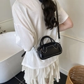 Crossbody bag in black patent leather with silver rivets and dual handles - Black