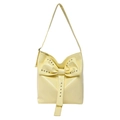 Pale yellow patent leather shoulder bag with large studded bow and silver rivets - Yellow