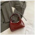 Minimalist wine red glossy patent leather hobo bag with a sleek silver chain strap - Red