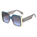 Vierkante oversized zonnebril met blauwe verloopglazen en gestreepte details - Blauw Gestreept Frame Grijs Blauw