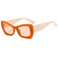Modern Y2K cat-eye sunglasses with orange frames and light pink temples on white background - Orange Frame Beige Temple Champagne Lens