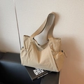 Minimalist khaki nylon tote bag with drawstring details and wide shoulder strap - Khaki