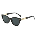 Square cat-eye sunglasses with gold chain temples and rivets in a 45-degree side view - Black Frame Grey Lens