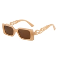 Lunettes de soleil rectangulaires crème avec des branches au design flamme ajouré - Monture Thé Verres Thé