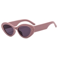 Pink cat-eye sunglasses with gold star accents and dark lenses on white background - Purple Frame / Purple Lens