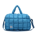Borsa a nuvola trapuntata blu in materiale imbottito con ampia tracolla regolabile - Blu