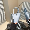 Sky blue litchi pattern leather mini handbag with silver rings and crossbody strap - Blue