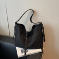 Minimalist black canvas tote bag with adjustable grommet strap and industrial design - Black