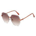 Gafas de sol geométricas sin montura con patillas naranjas y lentes de color marrón - Montura Roja Lentes Té