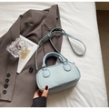 Chic light blue leather crossbody pillow bag with top handle and fashion logo embossing - Blue (No Charm)