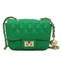 Mini bright green quilted crossbody bag with golden chain strap and ball ornament - Green