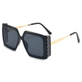 Square oversized sunglasses with black glitter frames and gold metal temples on white background - Black Frame Black Grey Lens