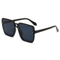Fashionable oversized square black sunglasses with dark gray lenses in a side view - Black Frame Black Grey Lens