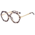 Polygonal tortoise frame sunglasses with thin gold metal temples on white background - Floral Frame Clear Lens