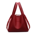 Chic red bucket bag with lychee pattern leather and elegant gold rivet details - Burgundy