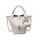 Chic beige lychee leather bucket bag with silver lock and heart charm detail - With Pendant / Off White
