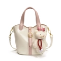Sac seau chic crème et rose avec garniture dorée et un joli pendentif ours peluche - Blanc