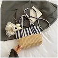 Navy canvas and straw bucket bag with white plush charm and adjustable strap - With Charm / Dark Blue