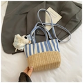 Blue and white striped canvas bucket bag with straw weaving and plush charm - With Charm / Light Blue