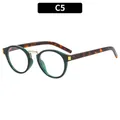 Y2K retro cat eye sunglasses with dark green translucent frame and tortoiseshell arms - Green Frame Clear Lens (C5)