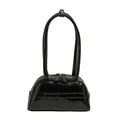 Glossy black bowling handbag with decorative bow and top handle in minimalist style - Black