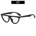Retro black cat-eye sunglasses with glossy frames and clear lenses for a vintage style - Black Frame Clear Lenses