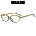 Translucent olive green cat-eye sunglasses with oval frames and silver metal hinges - Olive Green Frame Photochromic Lens