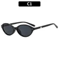 Y2K vintage cat-eye sunglasses in C1 gloss black finish with silver stud accents - Black Frame Grey Lens
