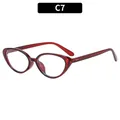 Y2K retro oval cat eye sunglasses with translucent ruby red frame and silver rivet details - Transparent Red Frame Clear Lens (C7)
