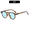 Retro oval sunglasses featuring a tortoiseshell frame with light blue lenses - Tortoiseshell Frame Blue Lens