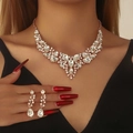 Detailed close-up of bridal rhinestone necklace and earring set in rose gold finish - 2-Piece Set(GT25273) / Rose Gold