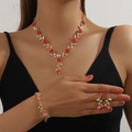 Detail of red floral crystal bridal jewelry set including necklace, bracelet and earrings - 3-Piece Set(GT25266) / Gold Red