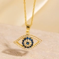Collier en acier inoxydable doré avec pendentif mauvais œil et oxydes de zirconium - Style Cœur Bleu Pierre Bleu Foncé Pavé de Zircone Blanc (BXL0342-2)