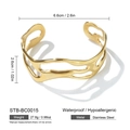 Detailed view of golden stainless steel open bangle with hollow wave pattern and measurements - Gold Irregular Wave Hollow Style (STB-BC0015)