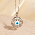 Silver evil eye necklace with blue zircon pendant and sparkling crystal accents - Blue And White Disc Evil Eye Style (BXL0342-76)