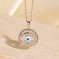 Silver Evil Eye necklace with blue zircon center and radiant texture detail - Silver Radial Evil Eye Style (BXL0342-80)