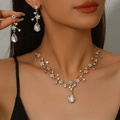 Golden bridal jewelry set with floral rhinestone necklace and pear-cut crystal earrings - 2-Piece Set(GT25232) / Gold White