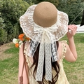Women's brown straw sun hat with white lace trim and large bow decoration for beach vacations - Light Lace Khaki