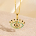Collier Main de Fatma doré avec zircons bleu clair et sertissage micro-pavé - Style Radial Cils Zircon Bleu Clair Noir (BXL0342-25)