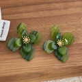 Detail of dark green resin flower earrings with gold center and sparkling rhinestone - Green