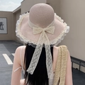 Light pink summer straw hat with wide lace brim and large cream ribbon bow accent - Pink Potted Flower Edge