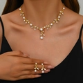 Elegant gold pearl jewelry set featuring vine leaf necklace and matching earrings for women - 2-Piece Set(GT25249) / Gold