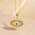 Collier Mauvais Œil doré avec pierre bleue et zircons noirs sur support pierre - Style Œil Bleu Radial Zircone Noir Blanc (BXL0342-42)