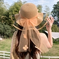 Women's straw sun hat with orange mesh bow and flowers for beach vacations - Wavy Khaki