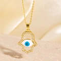 Collier Main de Fatma dorée avec pendentif œil bleu et zircons blancs étincelants - Style Main de Fatma Pavé de Zircone Doré (BXL0342-58)