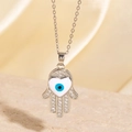 Collier main de Fatma argentée avec cœur blanc et œil protecteur bleu au centre - Style Main de Fatma Œil Bleu Cœur Argenté (BXL0342-61)